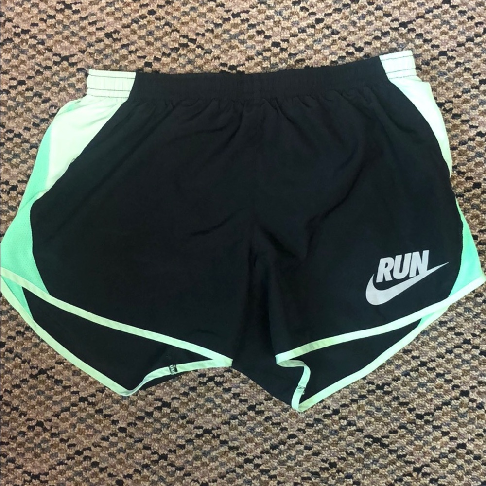 NIKE runner shorts.